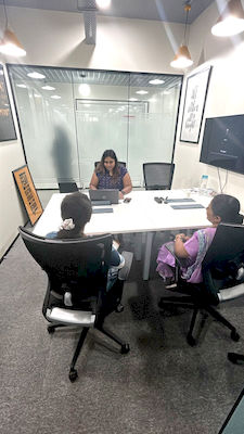 upGrad Bhubaneswar office - student and parents with the counselling team after their study abroad session